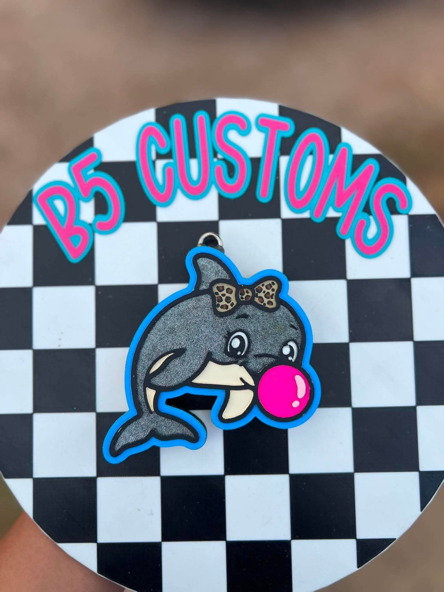 Dolphin with bow blowing a bubble car freshie mold