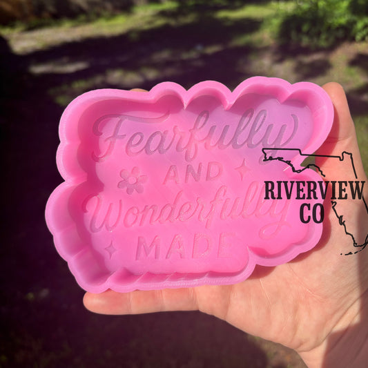 Fearfully and wonderfully made car freshie mold