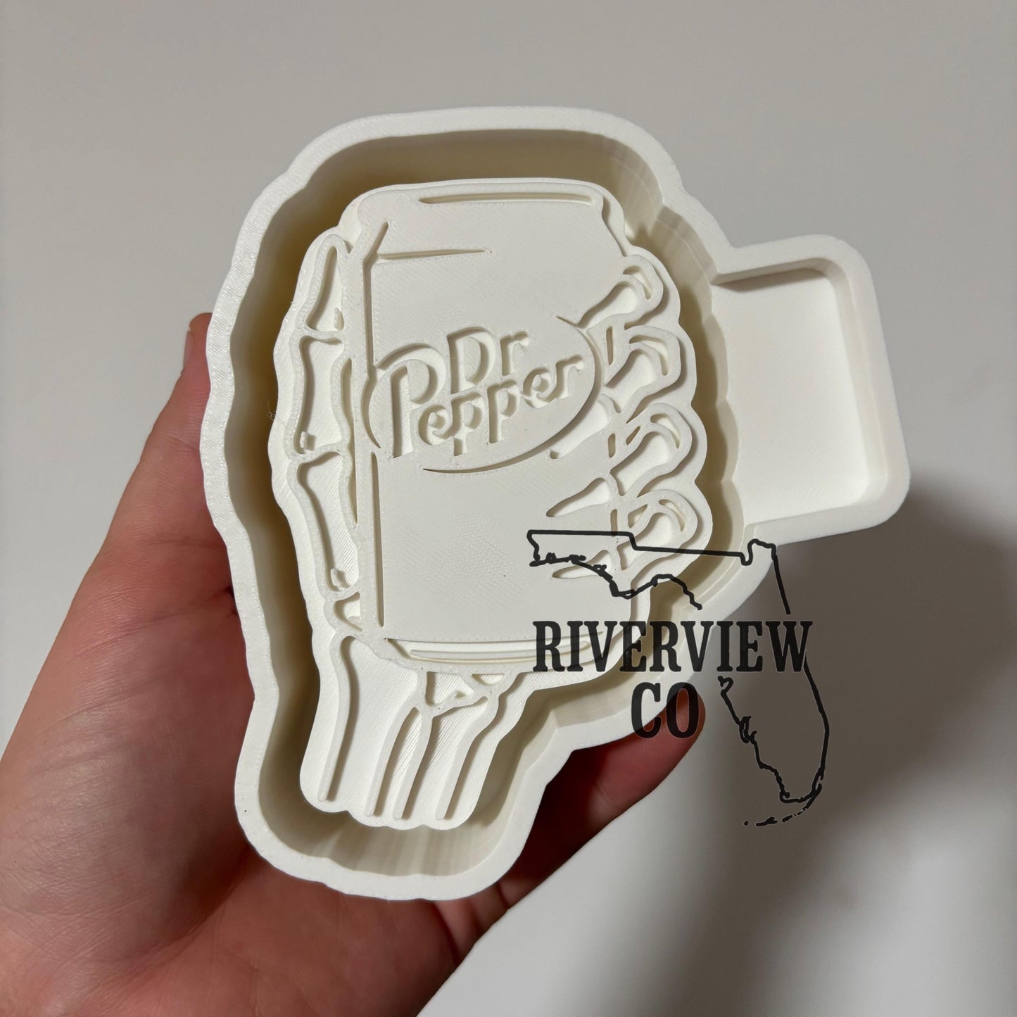 skeleton hand holding a can of Dr car freshie mold