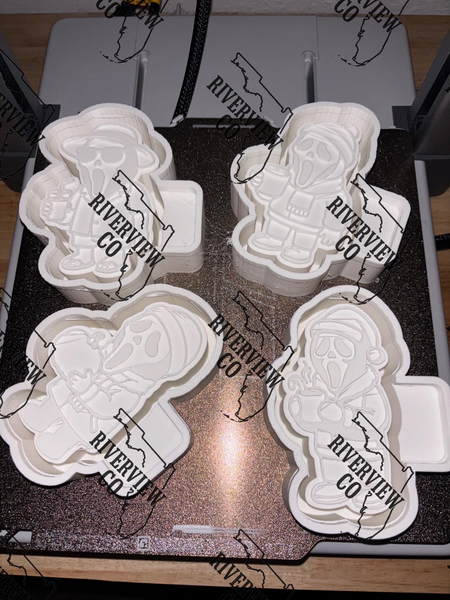 Christmas Ghost face wearing a Santa hat drinking hot coco with candy cane car freshie mold