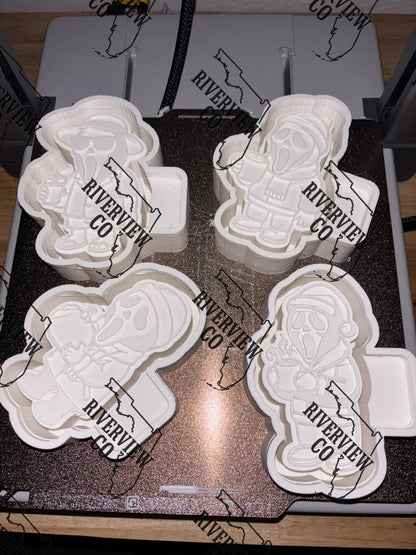 Christmas Ghost face wearing a Santa hat drinking hot coco with candy cane car freshie mold